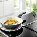 Accessoire de cuisine pour plaques à induction avec ergonomie