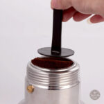 Accessoire doseur noir pour poudres