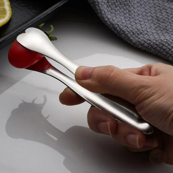 Ustensile de table pour servir le sucre