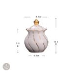 Accessoire de table : sucrier orné de dorures raffinées