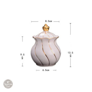 Accessoire de table : sucrier orné de dorures raffinées