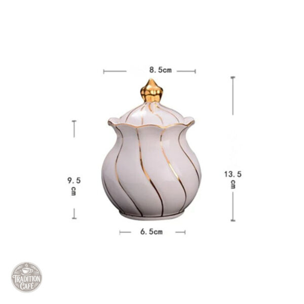 Accessoire de table : sucrier orné de dorures raffinées