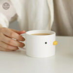 Tasse en forme de canard pour un café amusant