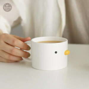 Tasse en forme de canard pour un café amusant