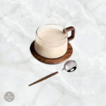Tasse transparente élégante pour café avec soucoupe