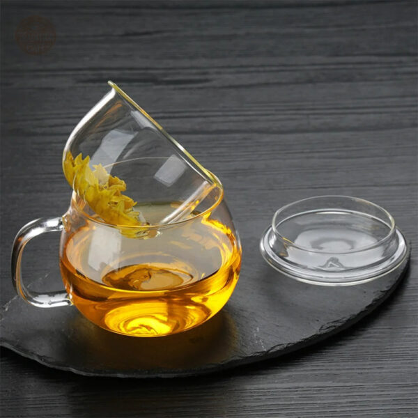 Couvercle pour tasse à thé avec infuseur